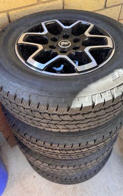 Bridgestone dueler a/t rims and oem rims