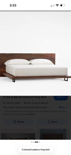 Crate & Barrel king platform bed and matching nightstand.