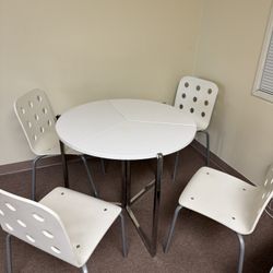 Moving Sales- White round foldable table set including 4 chairs
