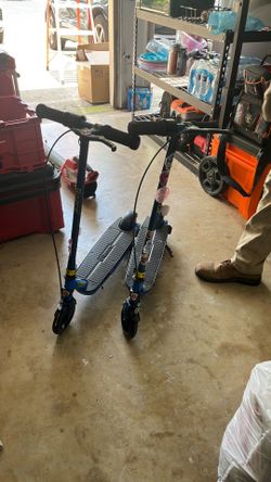 $200 for both! Great condition Razor scooters with two helmets