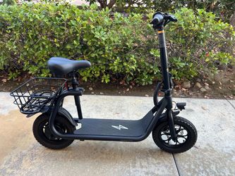 Electric scooter seated ( open box) currently sold at Costco