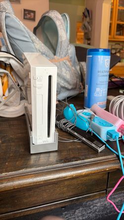 Wii Console with Nunchucks and Dance Mat