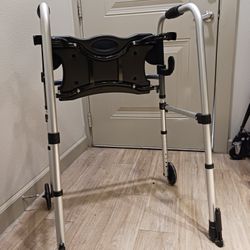 Drive folding walker with Seat that can be used In up or down  position