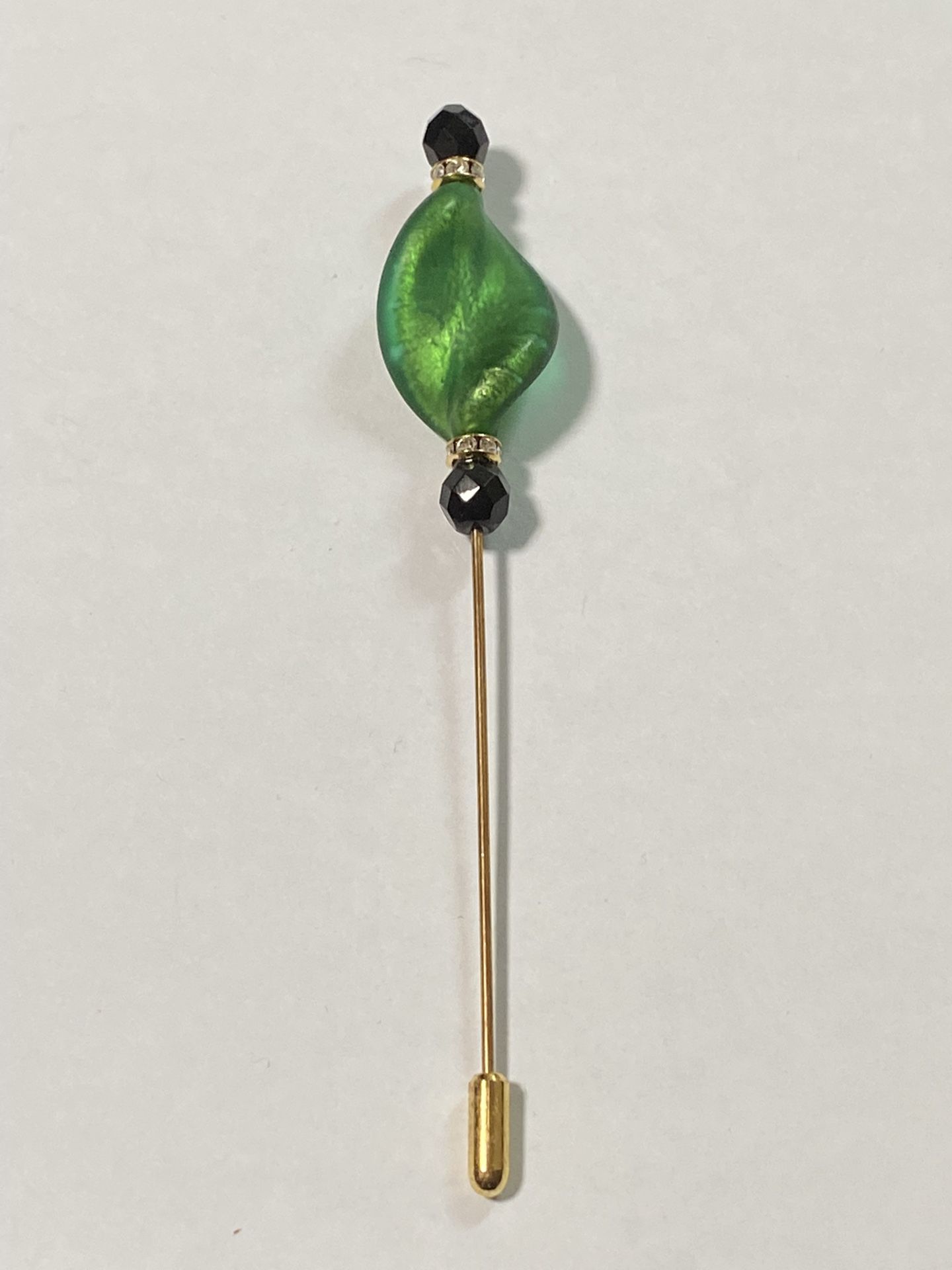 Gorgeous Hat/Lapel Pin, hair ornament, iridescent green glass, rhinestone spacers, black faceted beads