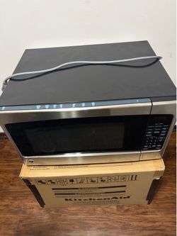 GE 2.0-cu ft 1200 -Watt Countertop Microwave ( Stainless )