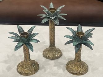 Set of 3 patinated brass palm tree candle holders. Made in India