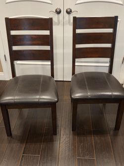 Dining room chairs Ashley Furniture Larchmont Collection