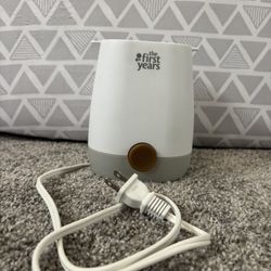 The first years simple serve fast baby bottle warmer and sanitizer 