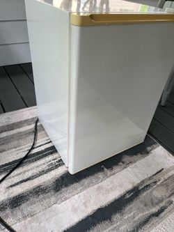Mini fridge. Waist high. Works great. Smoke free home.
