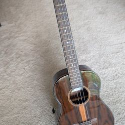 A MINT Kala Baritone Ukulele
