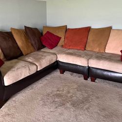 Tan sectional & pillows - will deliver 