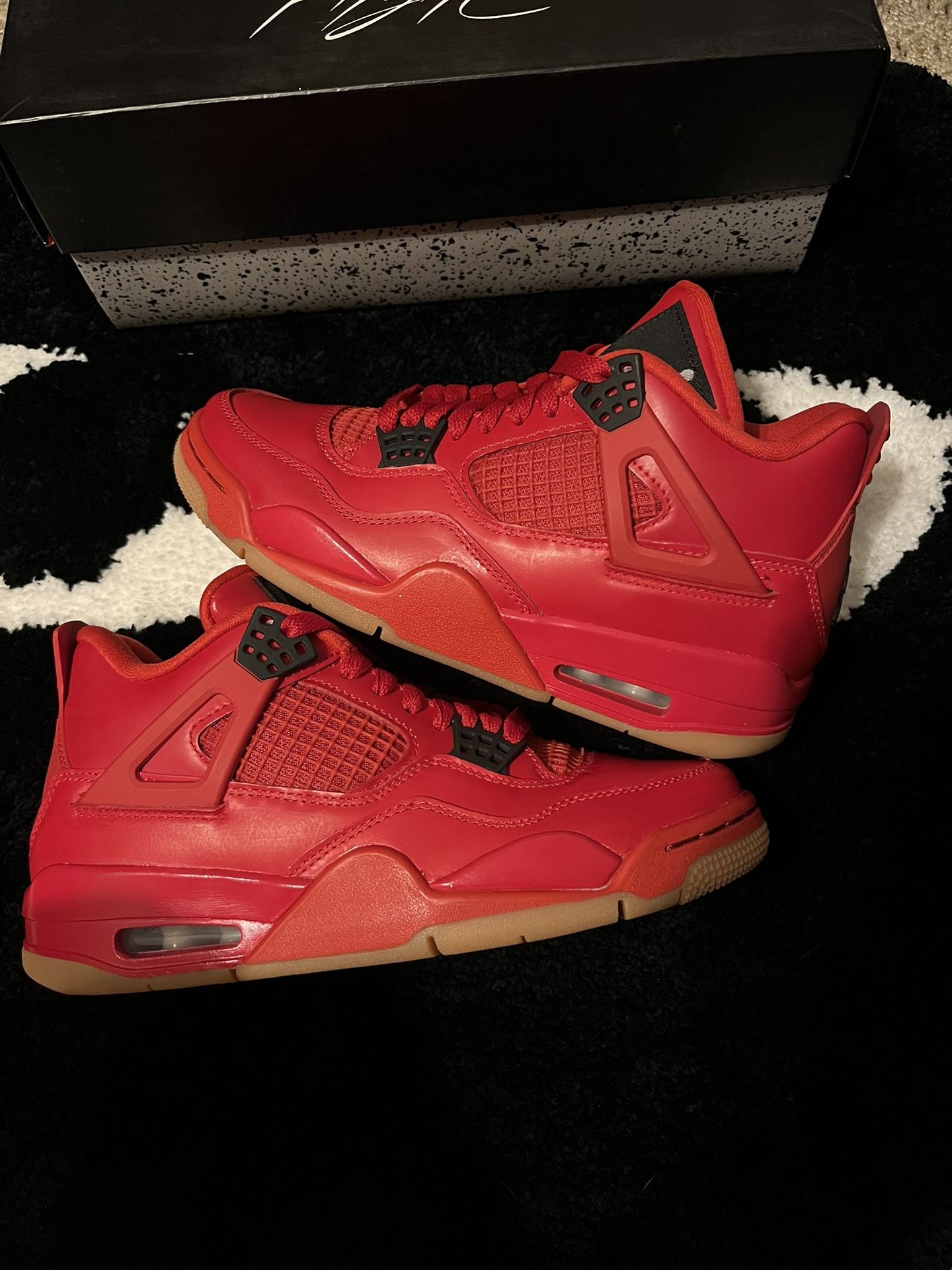 Fire Red Singles Day Jordan 4s