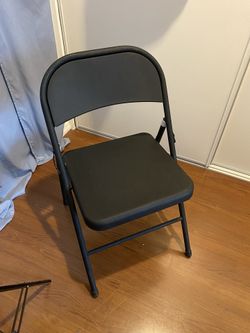 SEVEN METAL FOLDING CHAIRS