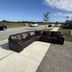 Free Delivery- Cindy Crawford Leather Sectional Couch