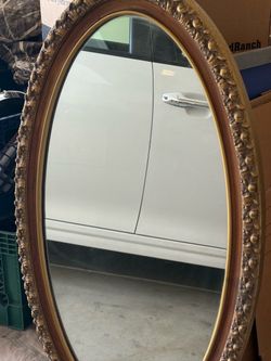 Oval Wall Mirror with Ornate Gold Frame