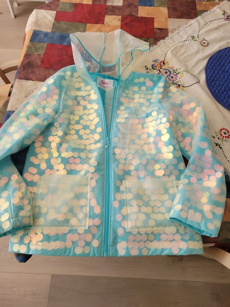 NEW JUSTICE RAINCOAT SZ 14/16 SEE DESCRIPTION