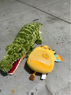 Stuffed croc and simba