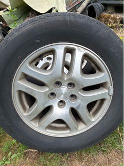 2001 Subaru rims and tires 225 16”
