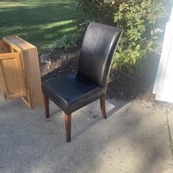 One Leather Padded Chair, 20w, 20 deep, back at 40, seat at 19 inch, $10