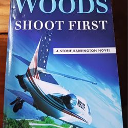"SHOOT FIRST" PAPERBACK BOOK BY STUART WOODS