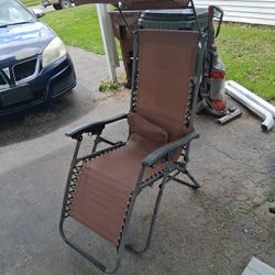 4 Brown Zero Gravity Lawn Chairs