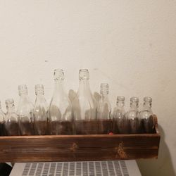 RUSTIC VINTAGE BOTTLE RACK AND BOTTLES