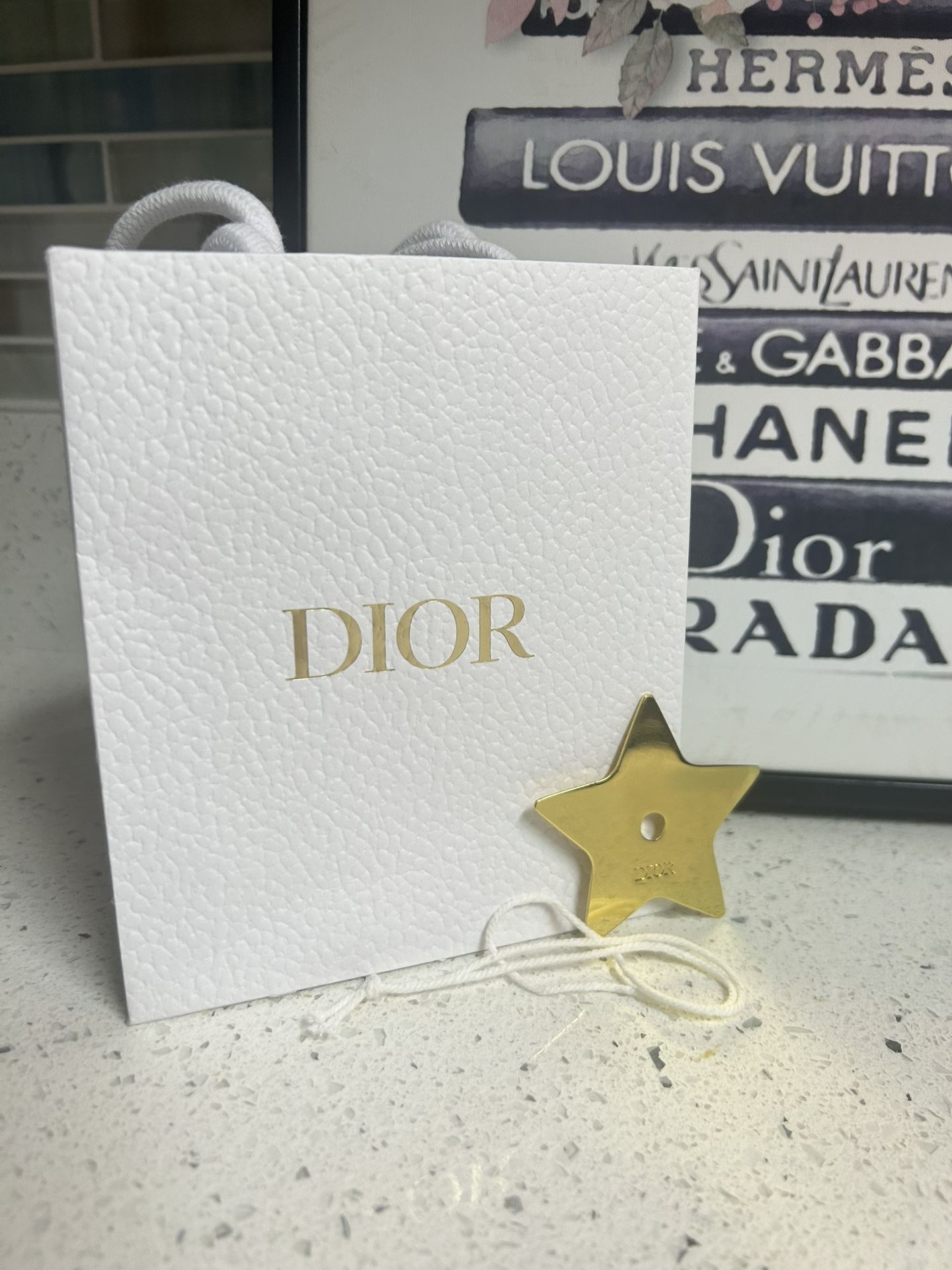 DIOR Gold Tone Star Charm Ornament Comes with string and Gift Bag