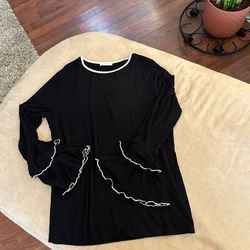 Women’s Long, Ruffled Sleeved Blouse