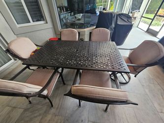 Aluminum outdoor table and six chairs