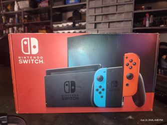 Nintendo Switch console bundle MAKE ME A OFFER!!!! featuring Neon Blue and Neon Red J
