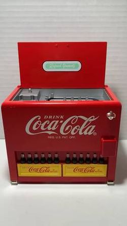 Vintage 1990's coca cola die cast cooler style table top battery operated musical vending machine plays jingle tune new never used located in palm spr