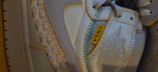 The Nike Air Jordan High  Summer of '96"OG SP x Union LA x Bephie's Beauty Supply is a collaboration sneaker featuring white leather with exposed gree