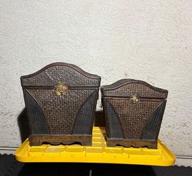 Set of 2 dark brown woven wood bamboo storage chests with hinged lids and decorative metal clasps.