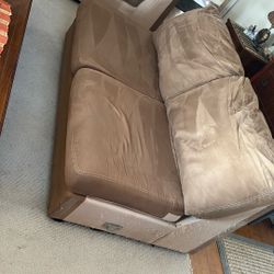Two Pieces Of A Sectional Couch 