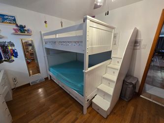 Full size (solid wood) bunk beds with hideaway bed. Mattress not included