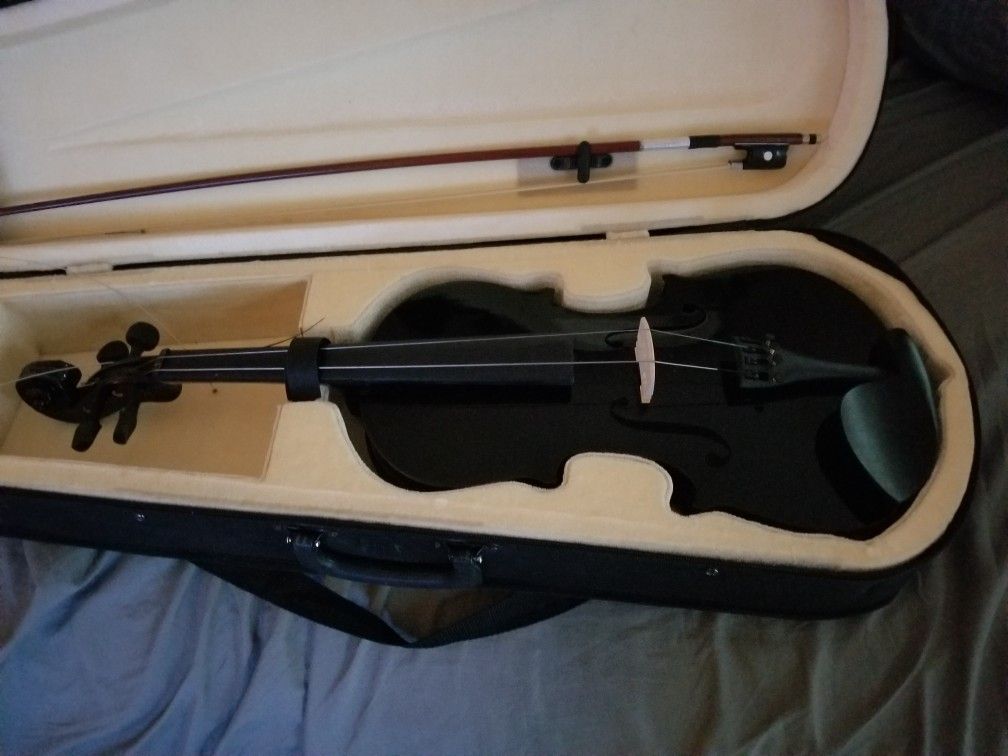 Black New Violin! Comes with extra strings,tuner,case and rosin
