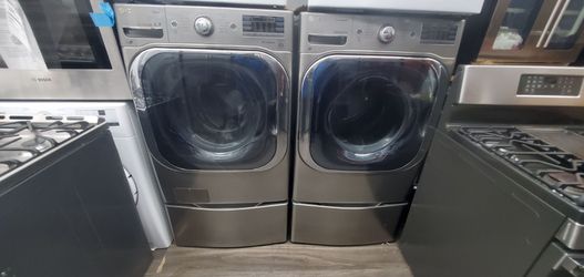 Washer and dryer gas great condition warranty big load 30 inches wide 50 pound load LG. 301 Saundview Ave Bronx NY 10473