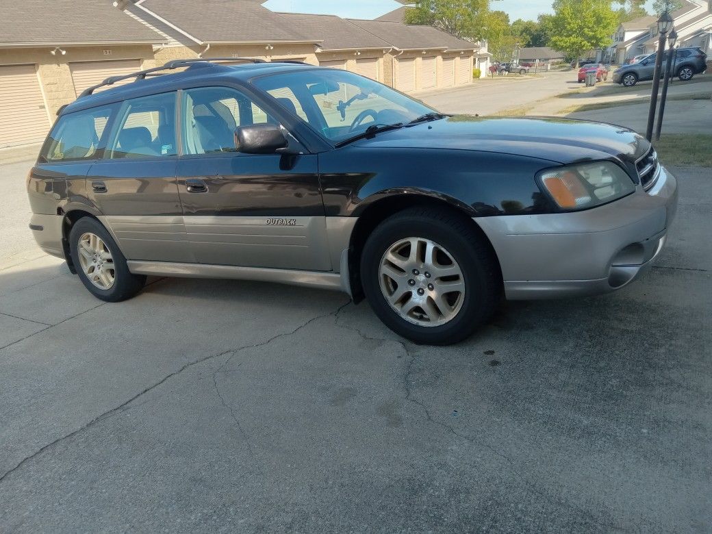 Out Back Subaru 2000 Black Color
