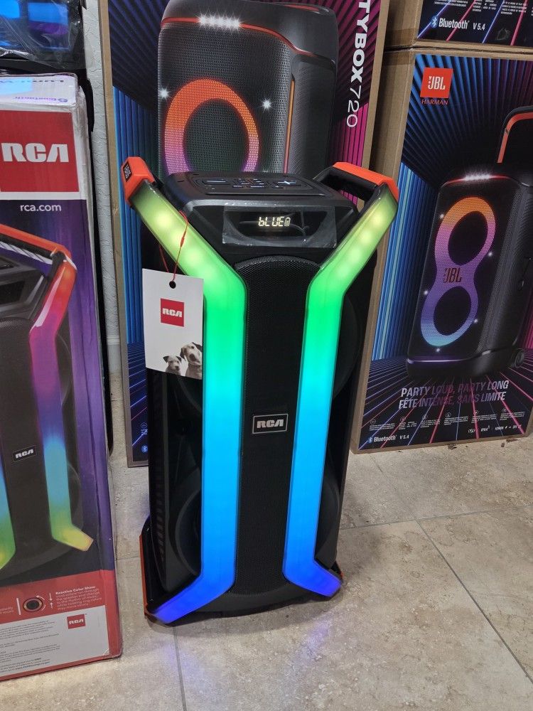 Portable and rechargeable speaker with bluetooth and party lights! Microphone included.