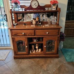 Dry bar , oak , like new , very heavy mirrors , perfect , all drawers and doors open
