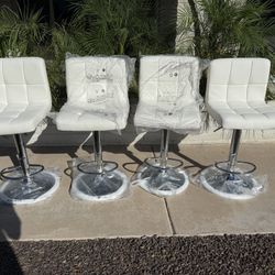 Brand new adjustable height bar stools only $60 Each