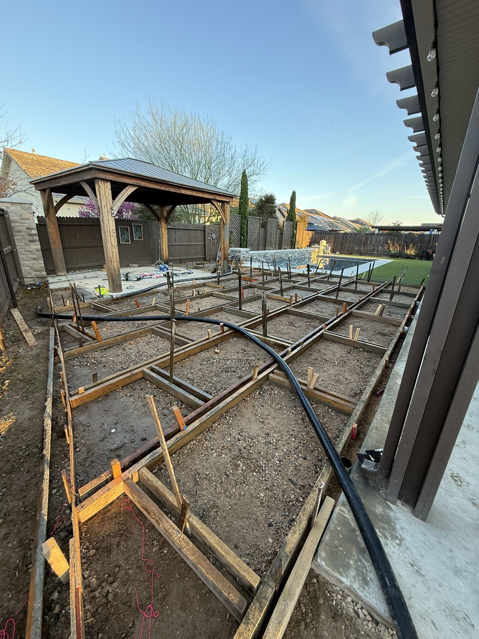 Concrete - Pump - Grass - Pool