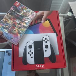 Brand New Nintendo Switch Oled w Mario Cart Deluxe 8 Game included 