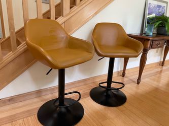 Telescoping counter chairs.