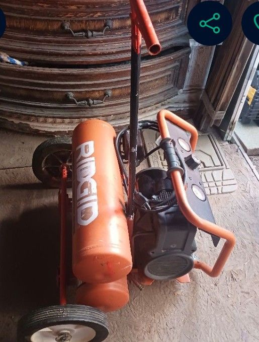 Rigid Twin Stack Compressor With Wheels And Removable Handle