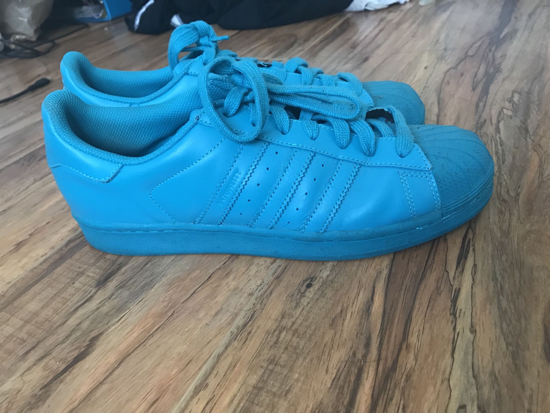 blue adidas superstars