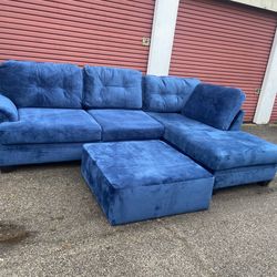 Nice blue Ashley sectional with ottoman (free delivery)