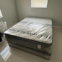 Queen Pillowtop Mattress And Box Spring. $190