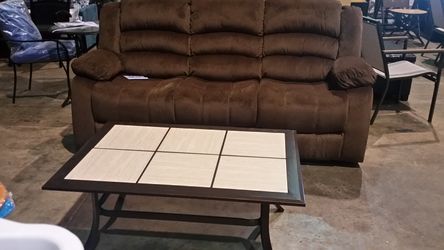 Brand new reclining sofa and coffee table