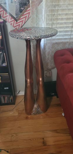 Bedazzled mannequin leg table